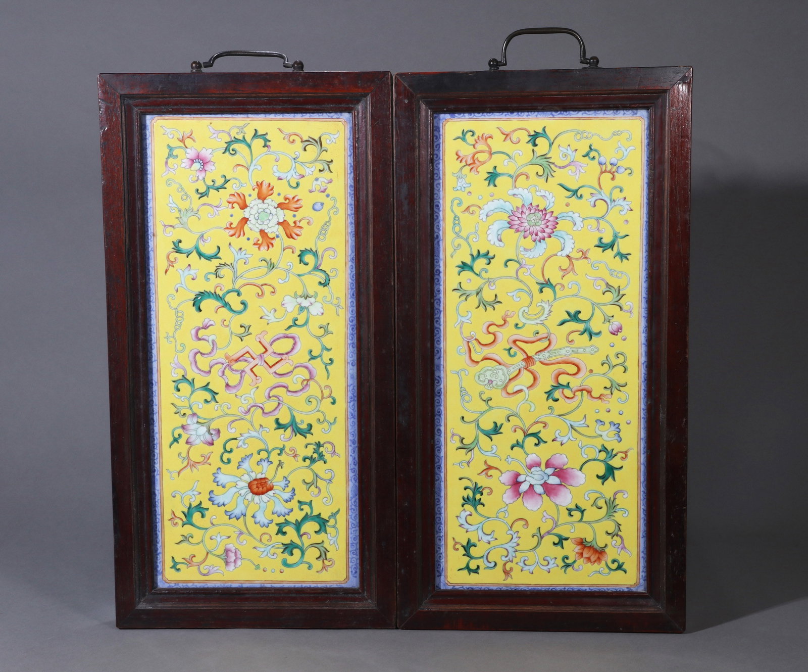 A PAIR OF YELLOW-GROUND YANGCAI 'FLORAL' PORCELAIN PANELS (1 of 6)