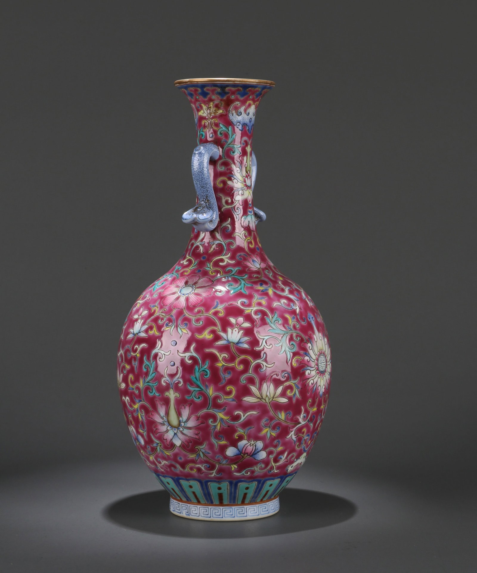 A RUBY-RED-GROUND FAMILLE-ROSE 'STYLIZED FLORAL' TWO-RUYI-HANDLED VASE (1 of 9)