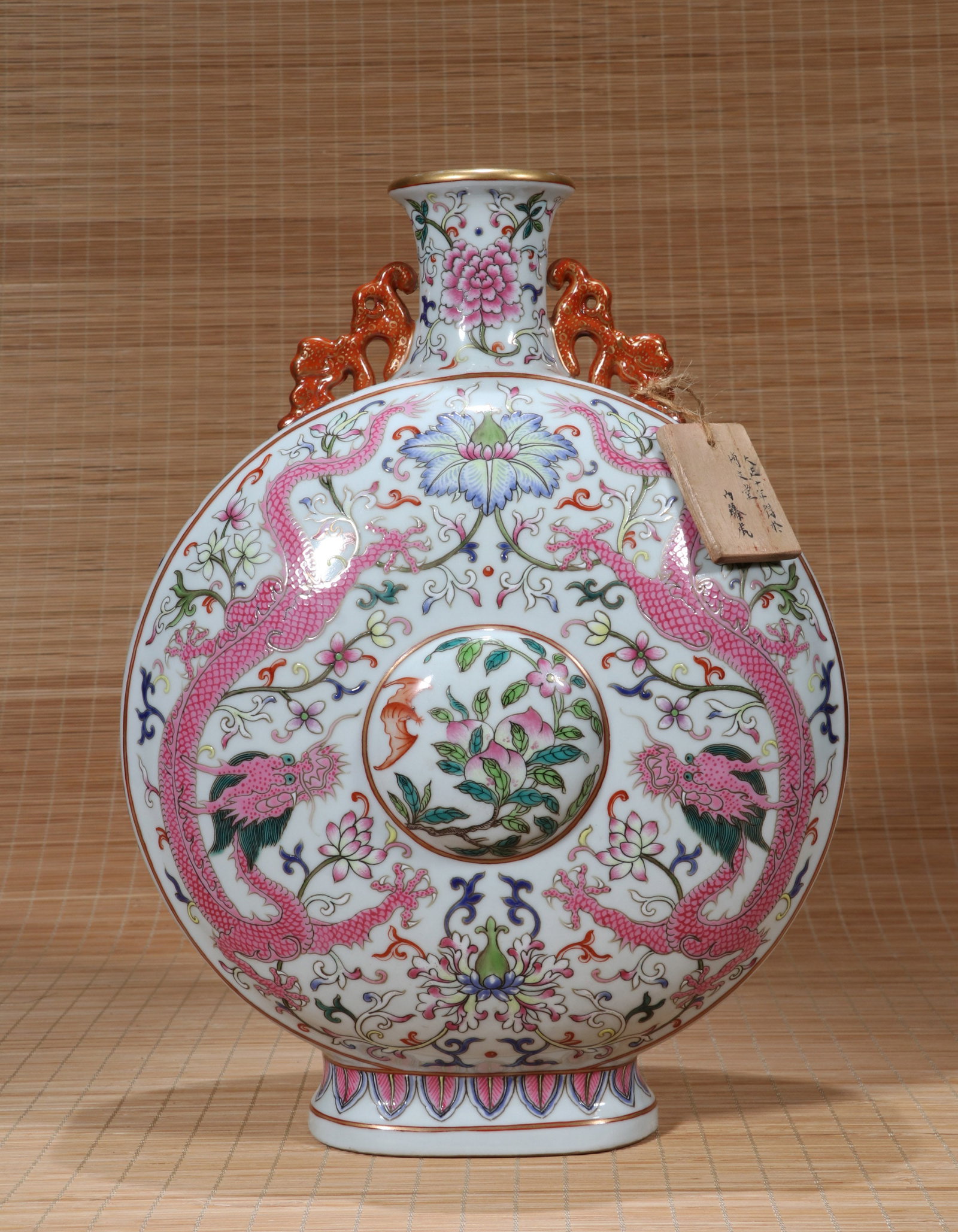 A YANGCAI 'DRAGONS, BATS AND LONGEVITY' TWO-HANDLED MOONFLASK (1 of 10)