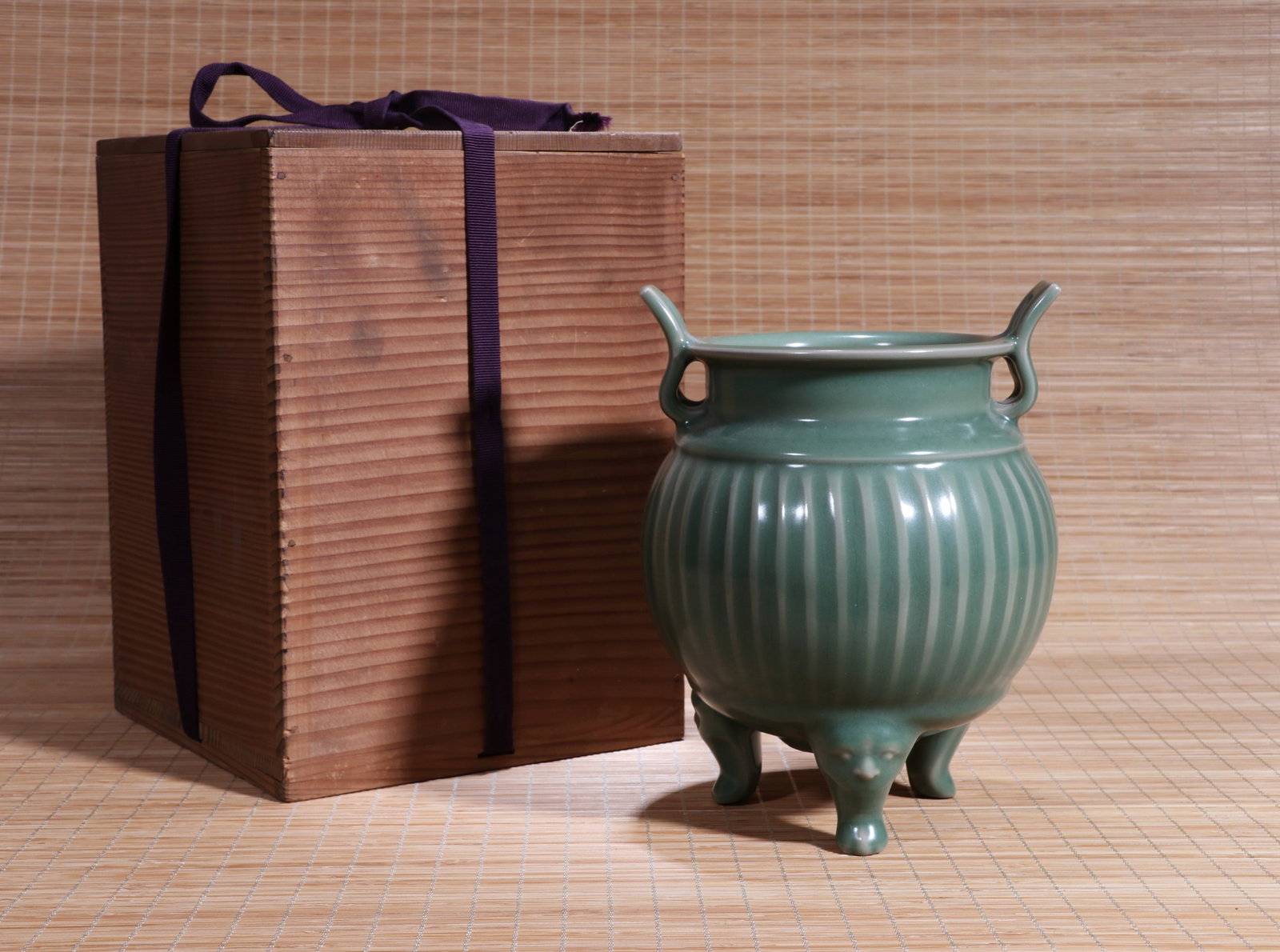 A LONGQUAN CELADON TRIPOD CENSER WITH RAISED RIBS (1 of 8)