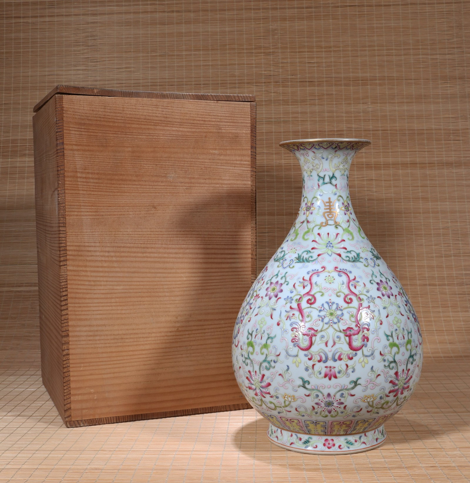 A FAMILLE-ROSE 'FLOWERS AND KUI DRAGONS' YUHUCHUN VASE: A famille-rose 'flowers and kui dragons' Yuhuchun vase. Height 29 cm.