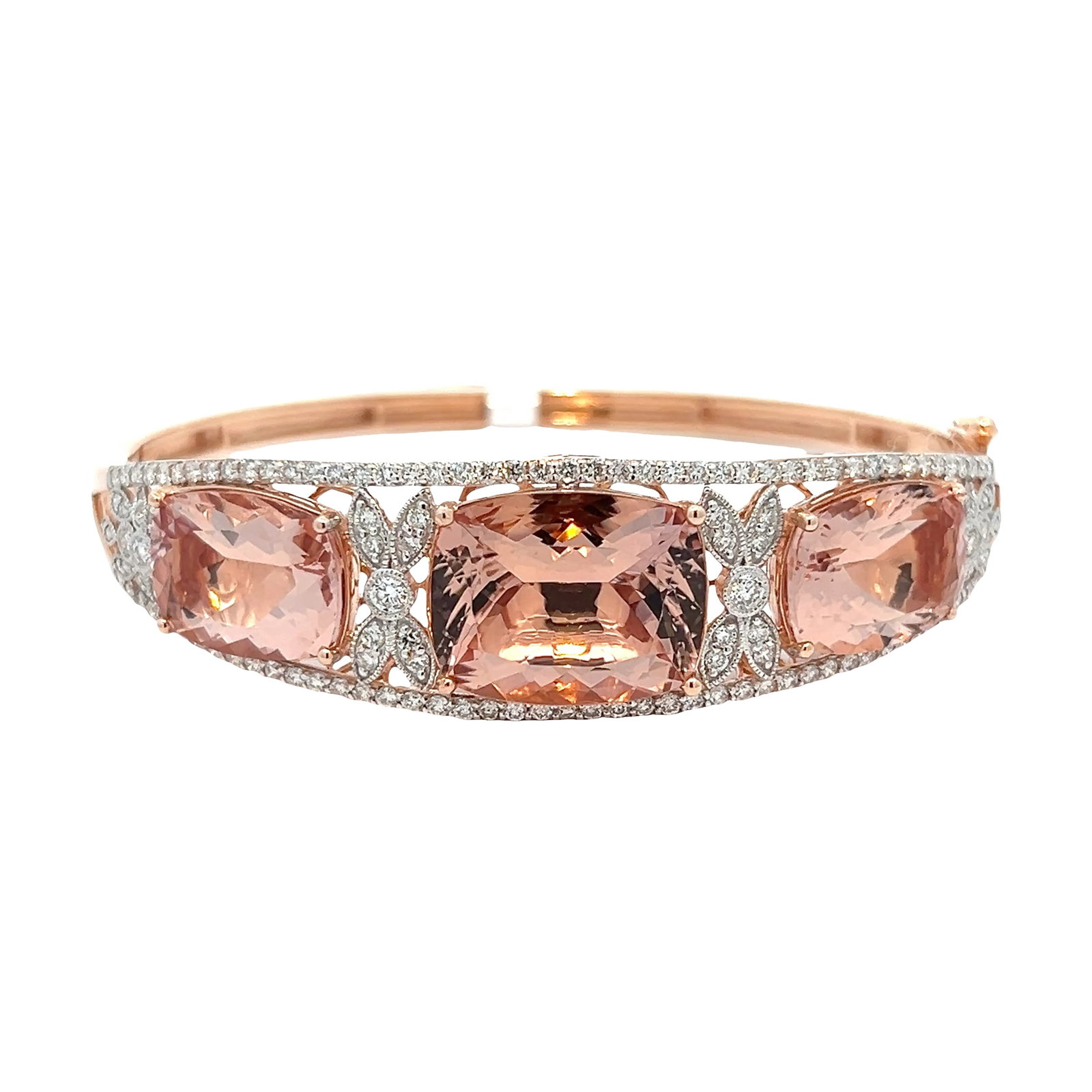 14K GOLD, MORGANITE AND DIAMOND BRACELET WITH GGA REPORT: 14K gold, morganite and diamond bracelet with GGA report. 25.9 grams 14K gold set with 1.98 carats of diamonds and 26.69 carats of morganite. Overall diameter: 6.5 x 5.5 cm