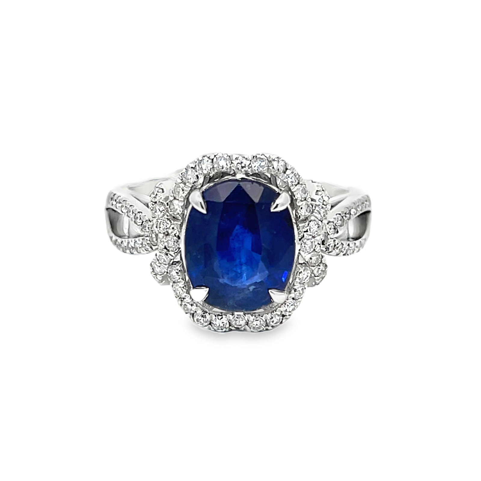 PLATINUM, SAPPHIRE AND DIAMOND RING WITH GGA & GIA: Platinum, sapphire and diamond ring with GGA & GIA. 6.5 grams platinum ring set with 0.45 carats of diamonds and 3.48 carats sapphire (GGA/GIA). Size: 6.75