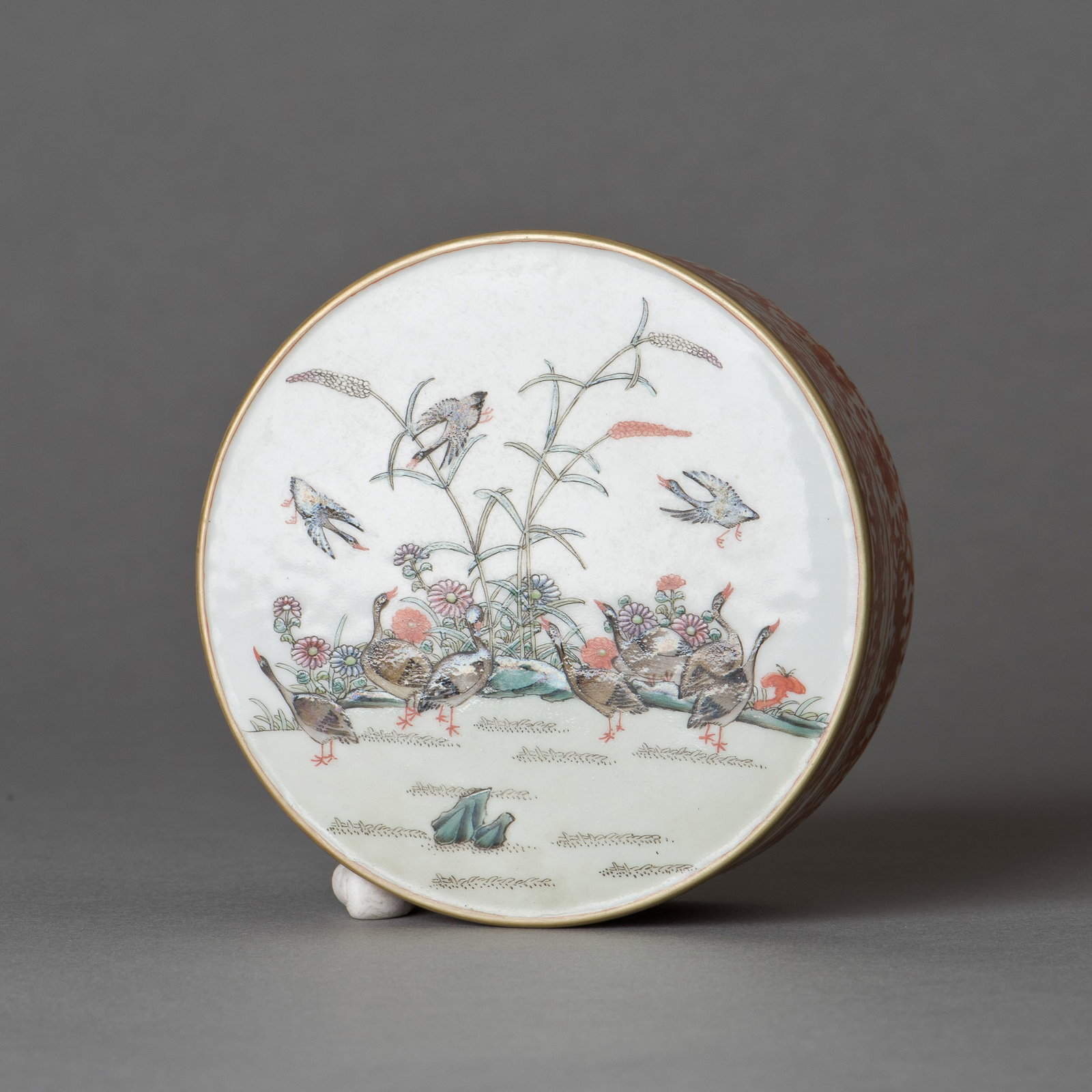 CHINESE FAMILLE ROSE PORCELAIN INK BOX, DAOGUANG MARK: Chinese famille rose porcelain ink box featuring paintings of ducks walking amongst reeds, six-character seal imprinted on the base. 1.75"h x 4.5"w (4.45 x 11.43 cm) Provenance: Property from an estat