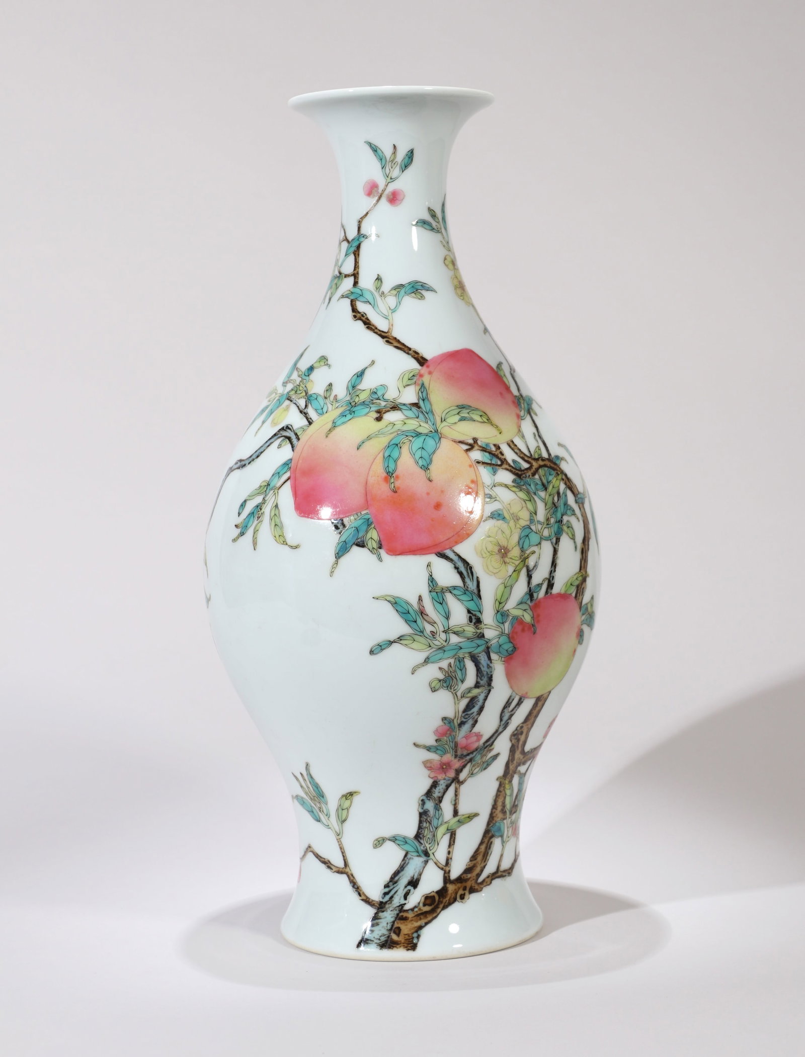A FAMILLE-ROSE 'PEACH' OLIVE-FORM VASE