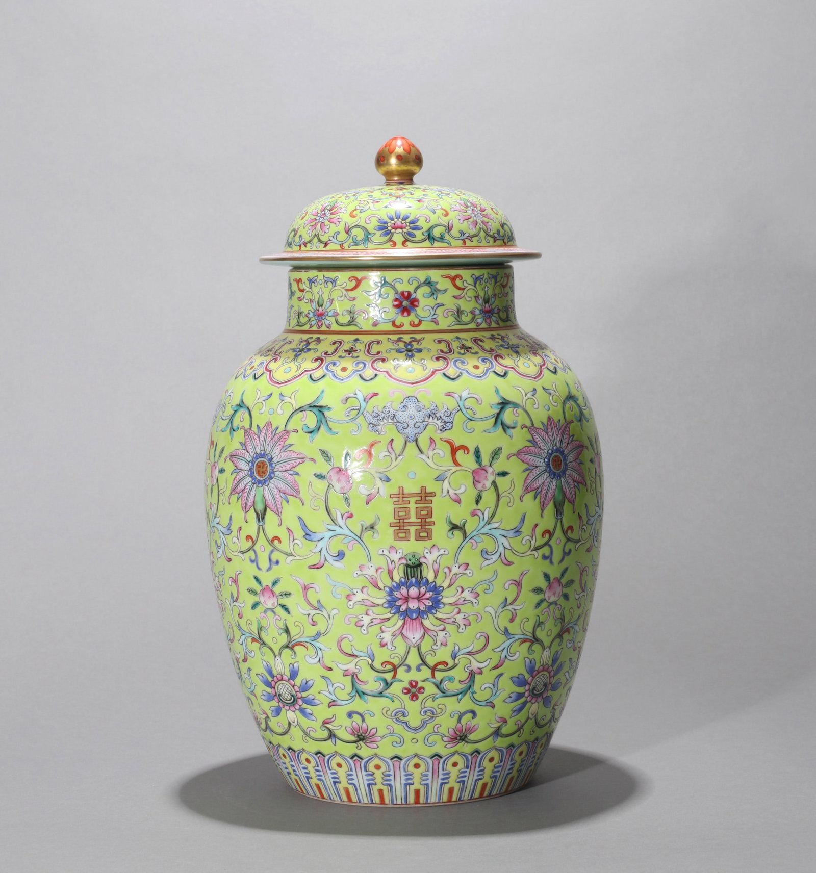 AN APPLE-GREEN-GROUND COVERED JAR WITH LOTUS SCROLLS AND DOUBLE-HAPPINESS CHARACTERS (1 of 15)
