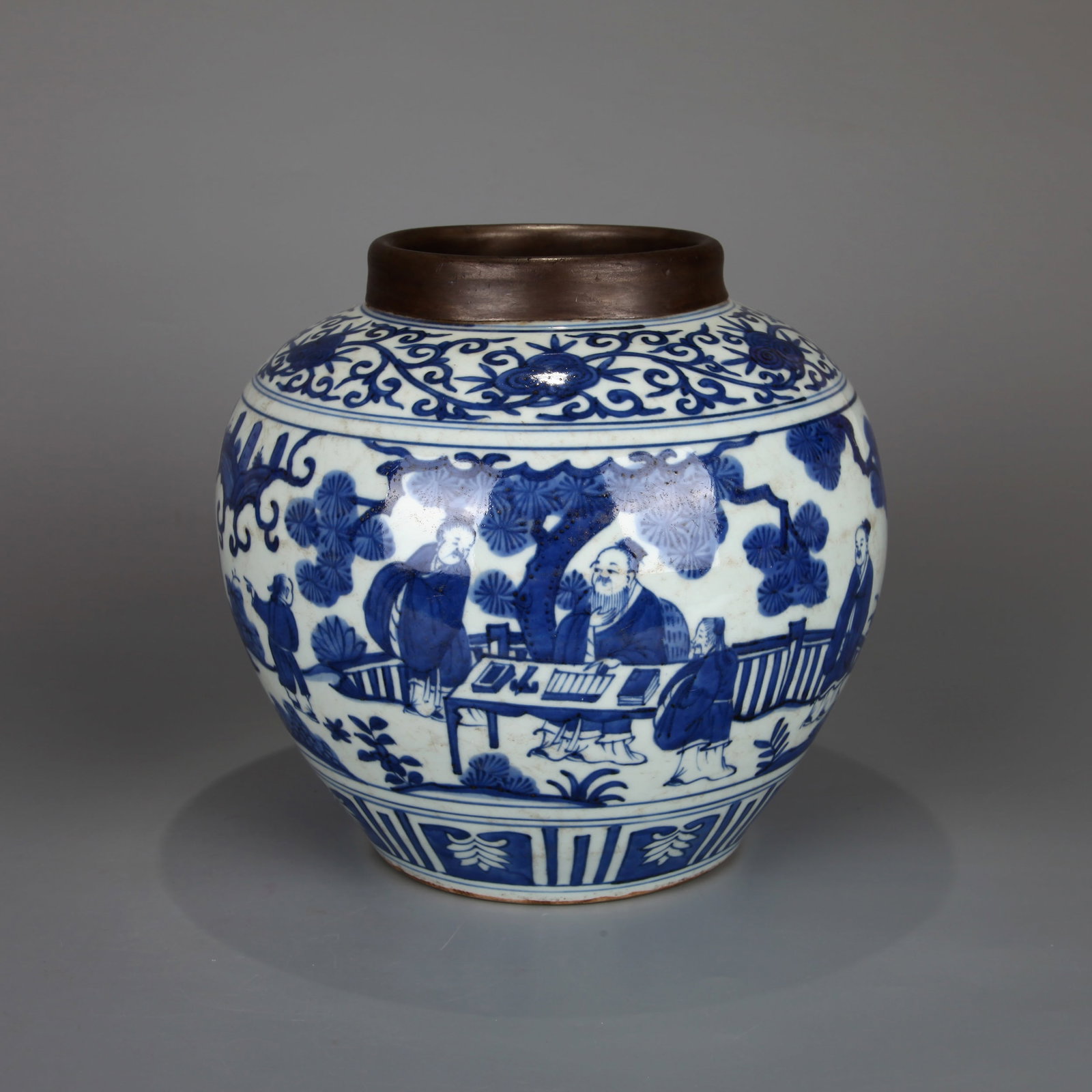 A BLUE-AND-WHITE JAR WITH FIGURE SCENES AND A METAL-MOUNTED RIM (1 of 9)