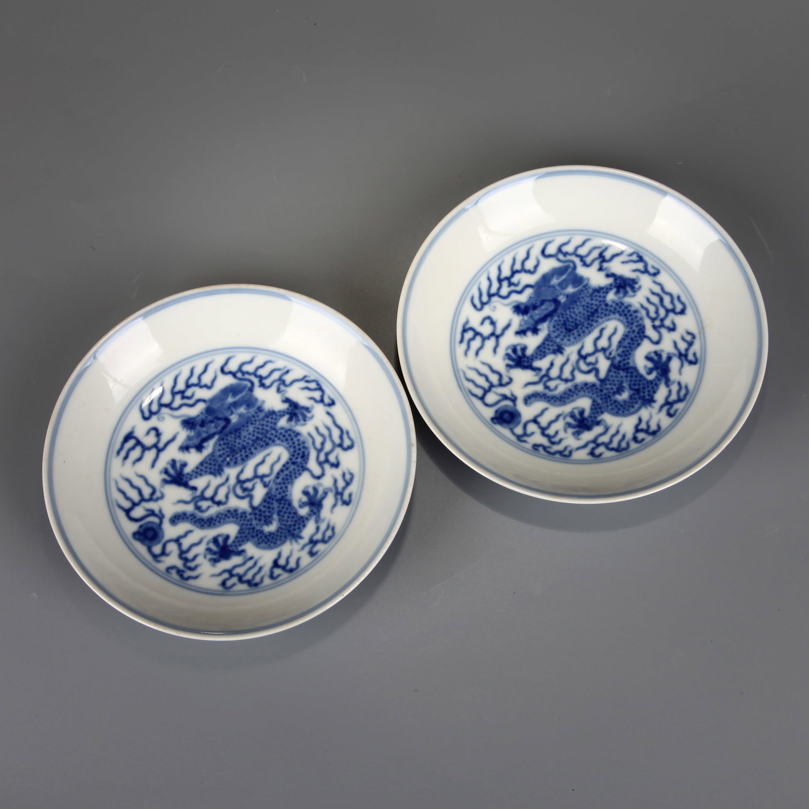 A PAIR OF BLUE-AND-WHITE 'STANDING DRAGON' DISHES