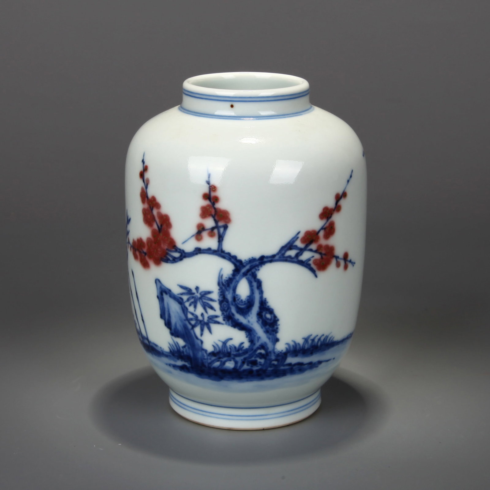 A BLUE-AND-WHITE AND IRON-RED 'THREE FRIENDS OF WINTER' JAR