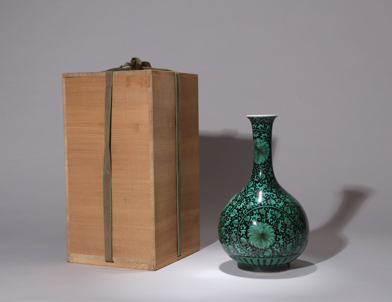 A BLACK-GROUND GREEN-ENAMELED 'FLORAL SCROLL' BOTTLE VASE (1 of 7)