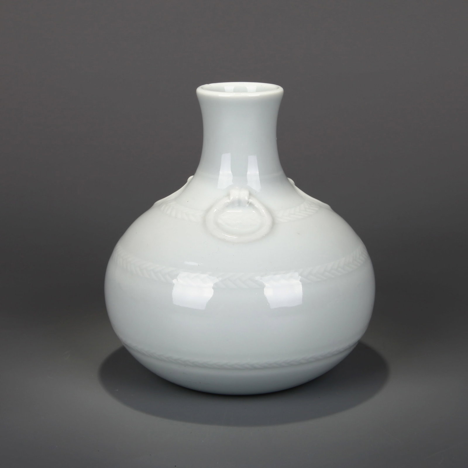 A SWEET-WHITE-GLAZED 'ROPE-TWIST' VASE