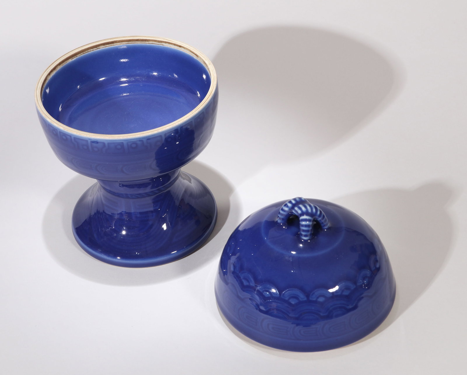A SACRIFICIAL-BLUE-GLAZED DOU: A sacrificial-blue-glazed dou. Height 26 cm.
