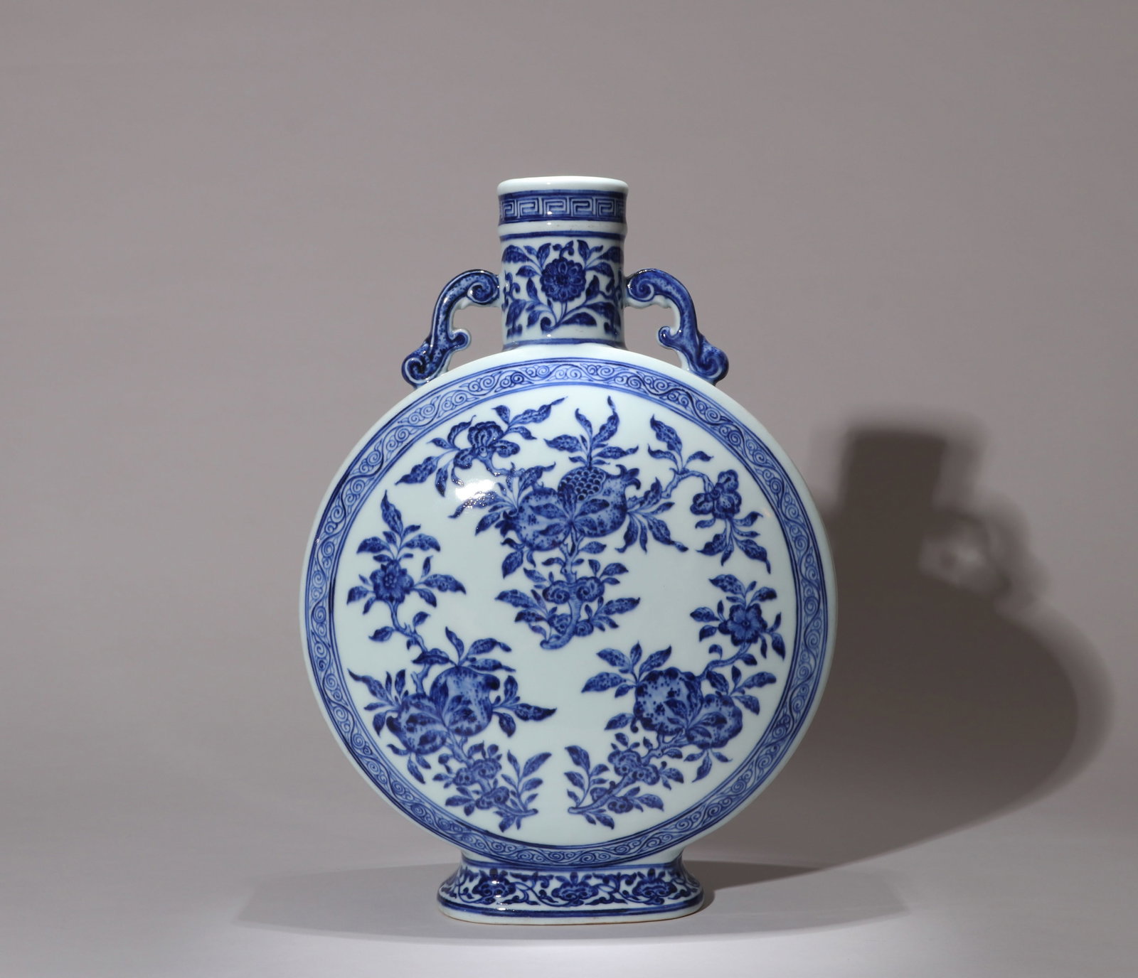 A BLUE-AND-WHITE 'SANDUO' MOONFLASK (1 of 11)
