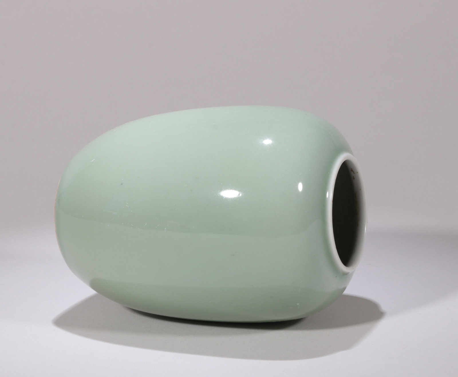 A CELADON-GLAZED JAR - 2