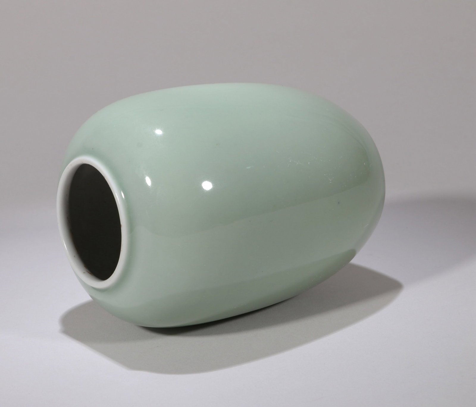 A CELADON-GLAZED JAR - 5