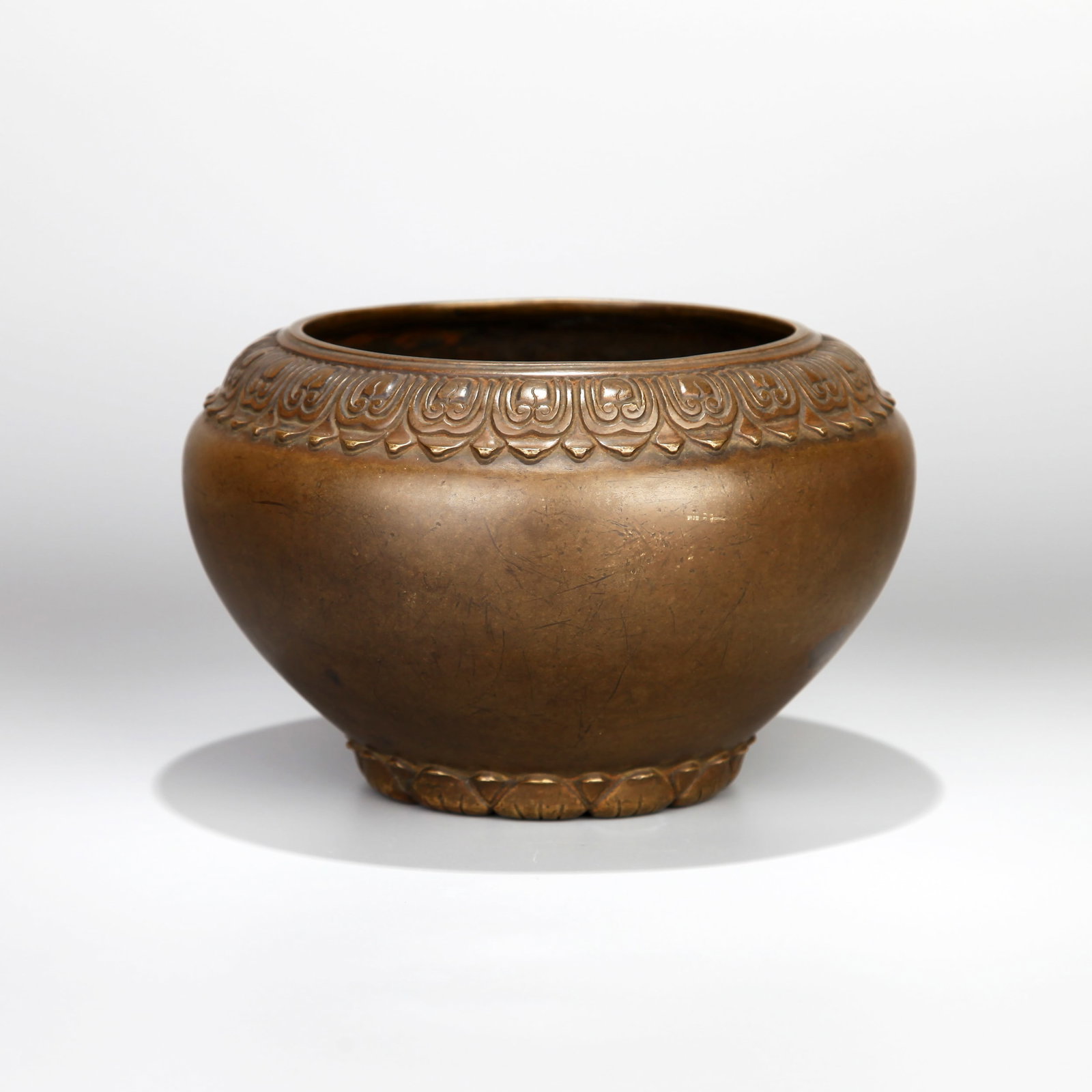A BRONZE BOWL-FORM CENSER: A bronze bowl-form censer. Height 11 cm, width 17 cm.