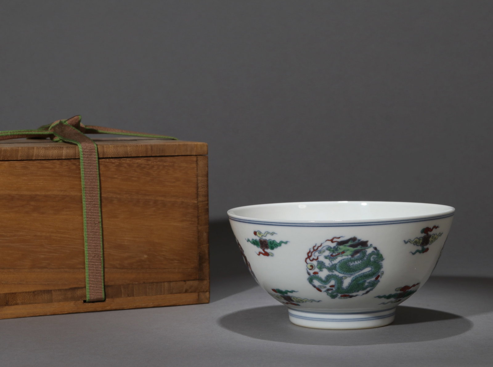 A DOUCAI 'DRAGON MEDALLION' BOWL: A doucai bowl with dragon medallions. Diameter 15 cm, height 7.2 cm.
