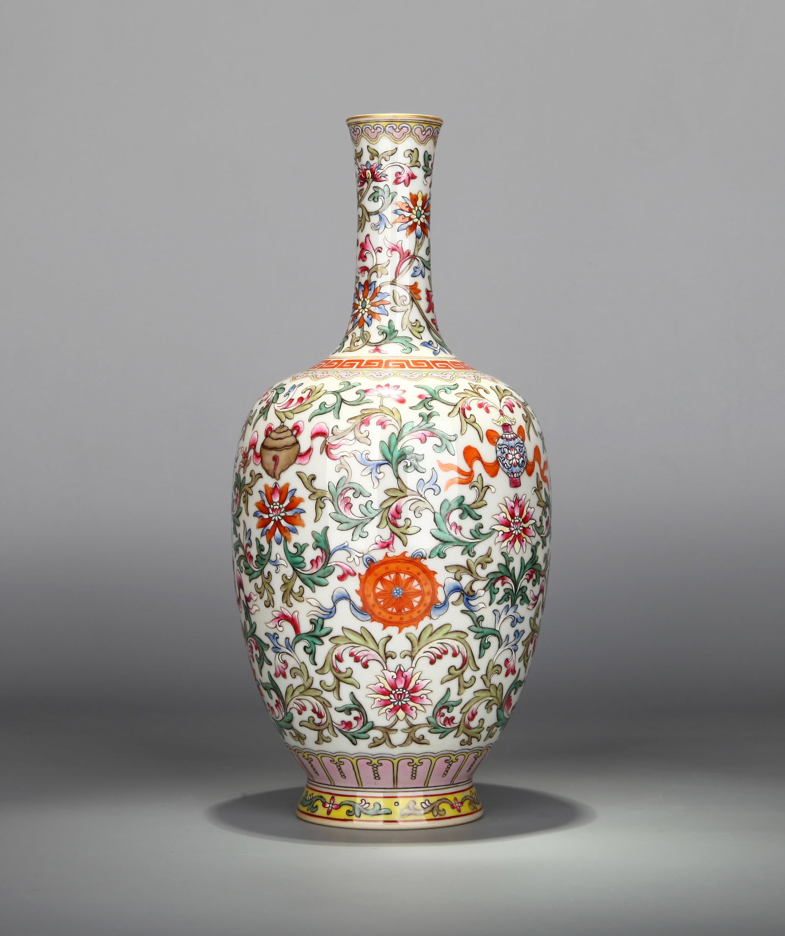 A FAMILLE-ROSE BOTTLE VASE WITH LOTUS SCROLLS AND THE EIGHT BUDDHIST EMBLEMS
