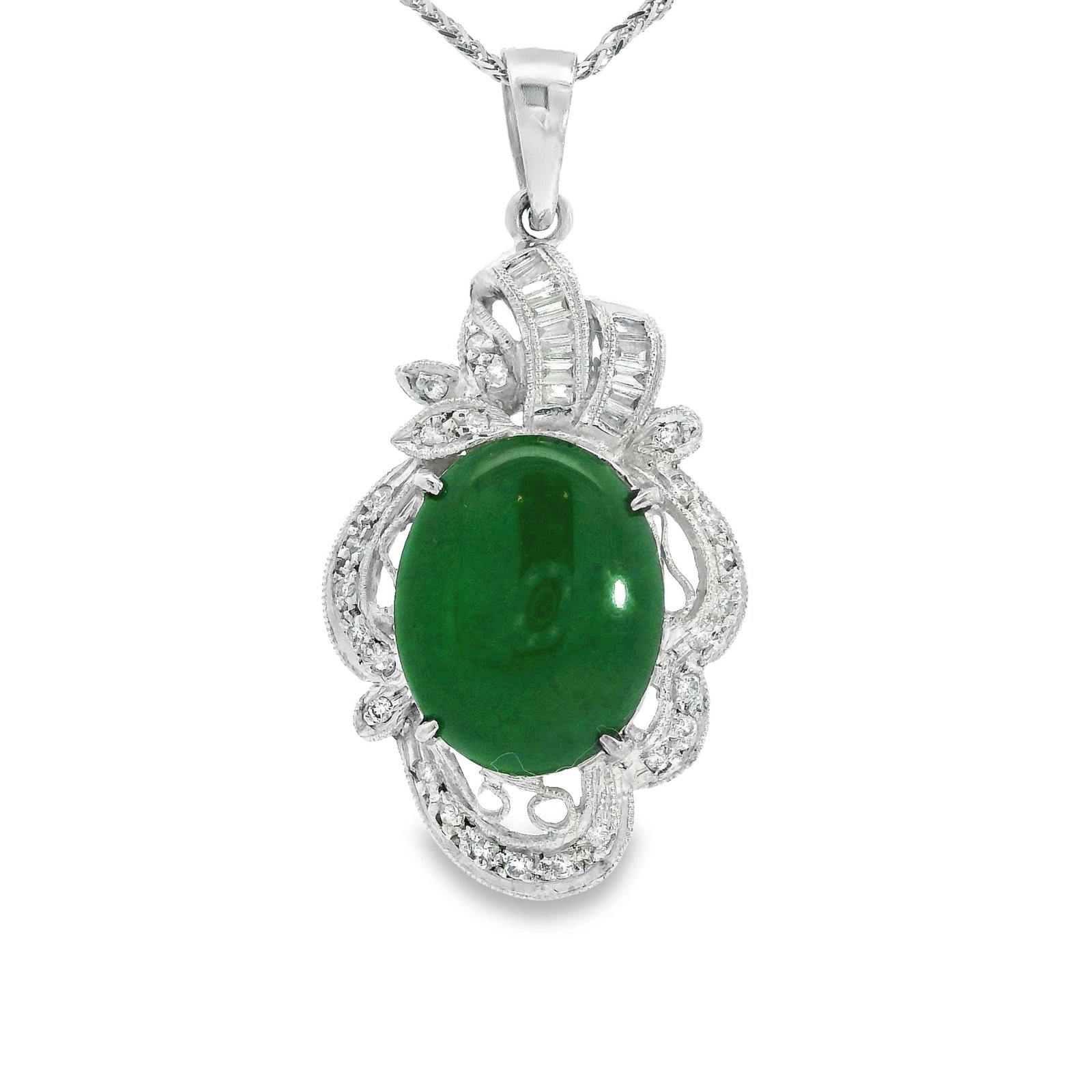 JADEITE, DIAMOND AND PLATINUM PENDANT NECKLACE: Jadeite, diamond and platinum pendant necklace centering an oval-shaped jadeite within a diamond-set frame and suspended from a 14K white gold chain. Pendant: 1.02"h x 0.71"w (2.6 x 1.8 cm); Chain len