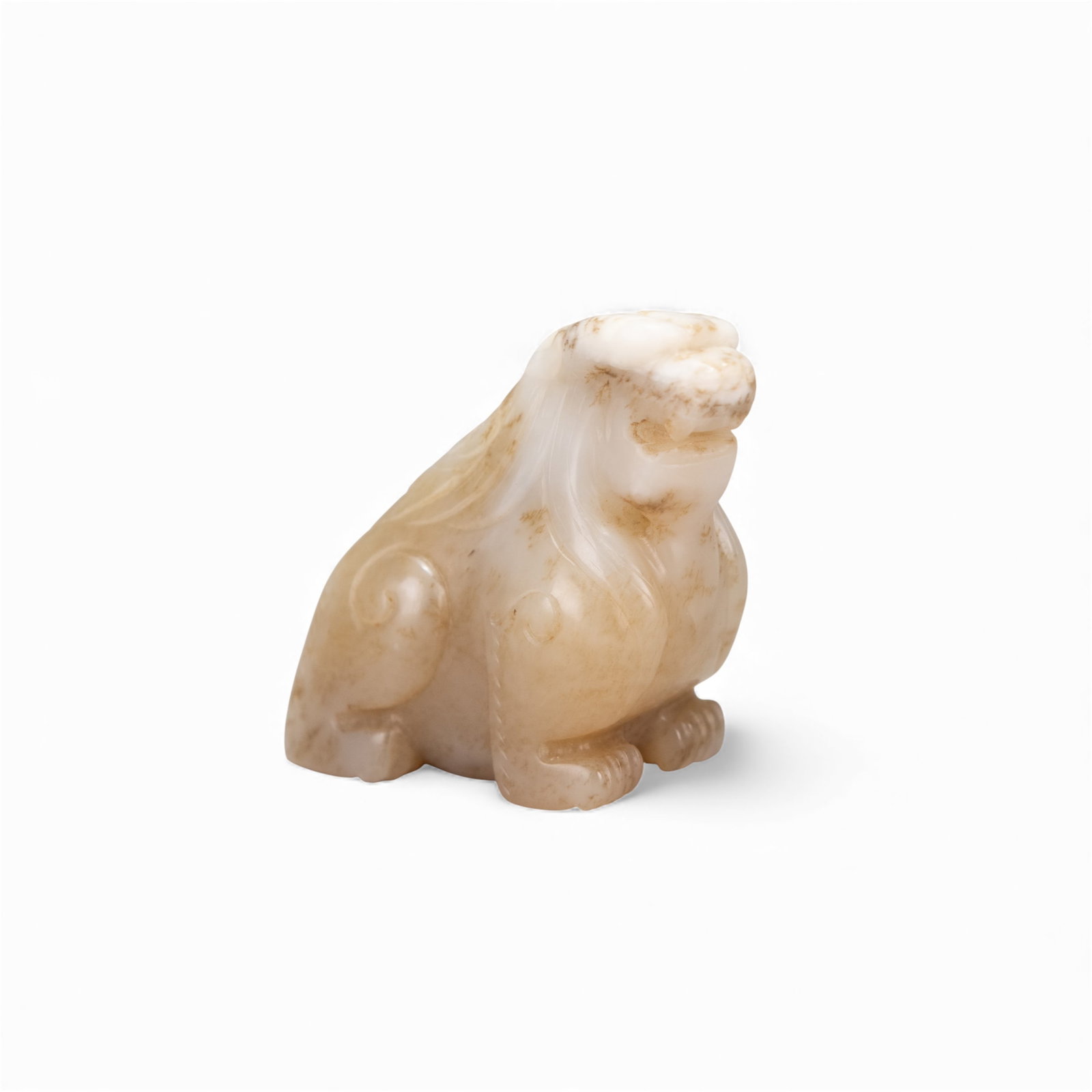 EARLY CHINESE JADE CARVING OF A MYTHICAL BEAST: Early Chinese jade carving of a mythical beast. 1.97"h x 1.77"w x 1.38"l (5 x 4.5 x 3.5 cm) Provenance: From an estate in Rancho Palos Verdes, California.