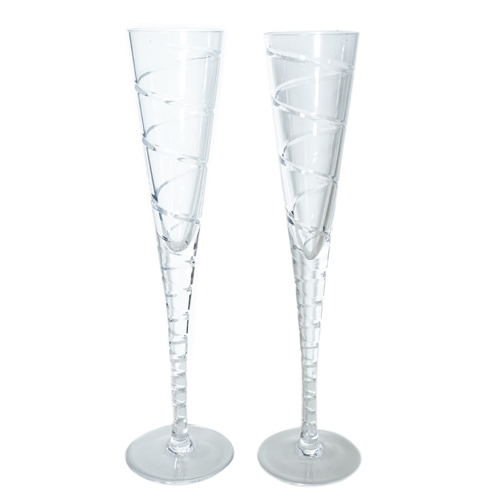 (LOT OF 2) GUMP'S CRYSTAL GLASS CHAMPAGNE FLUTES: (lot of 2) A pair of Gump's crystal glass champagne flutes. 12.2"h (31 cm) Provenance: Property of an estate in Pasadena, CA.
