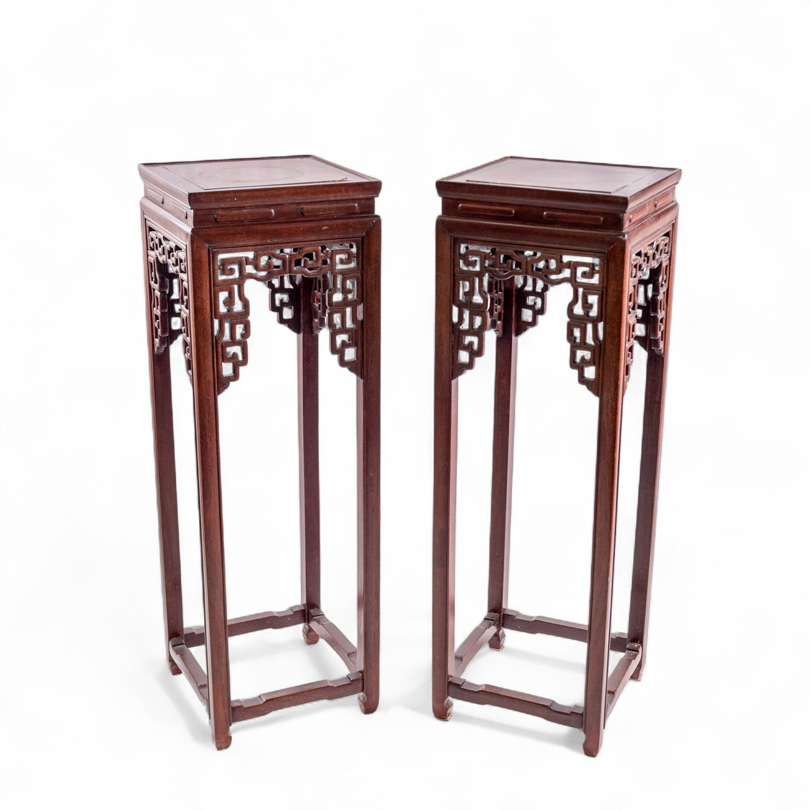 (LOT OF 2) PAIR OF CHINESE ROSEWOOD AND BURLWOOD STANDS, 19TH CENTURY: (lot of 2) Pair of Chinese rosewood and burlwood stands, 19th century, each inset with a burl panel above a foliate-carved frieze. Each: 39.76"h x 12.99"w x 12.99"d (101 x 33 x 33 cm)