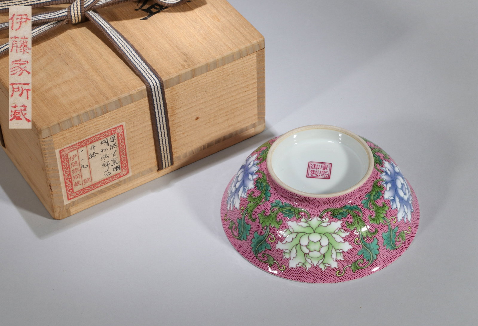 A RUBY-GROUND FALANGCAI 'FLORAL' BOWL: A ruby-ground falangcai bowl decorated with floral designs. Diameter 14 cm. Note: By repute, from the Ito family collection.