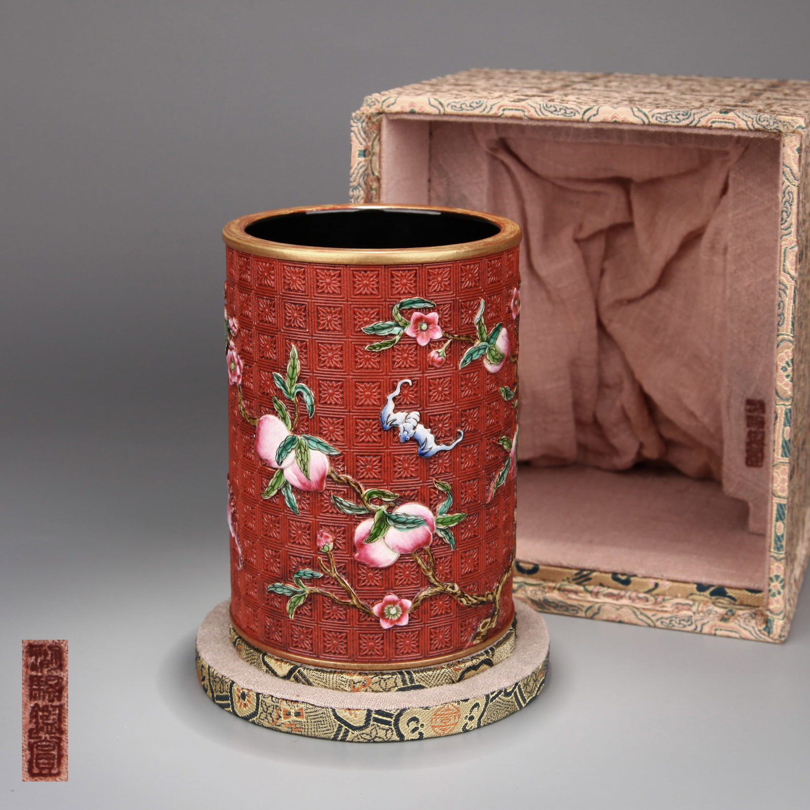 A PORCELAIN BRUSH POT IMITATING CARVED LACQUER WITH AUSPICIOUS DECORATION (1 of 10)