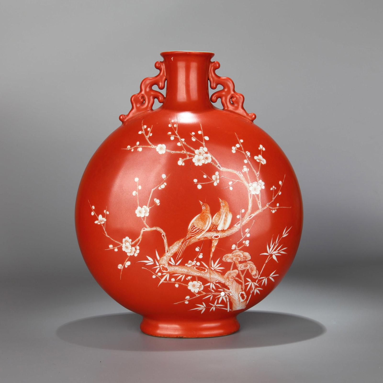 AN IRON-RED-DECORATED MOONFLASK WITH MAGPIES AND PRUNUS (1 of 10)