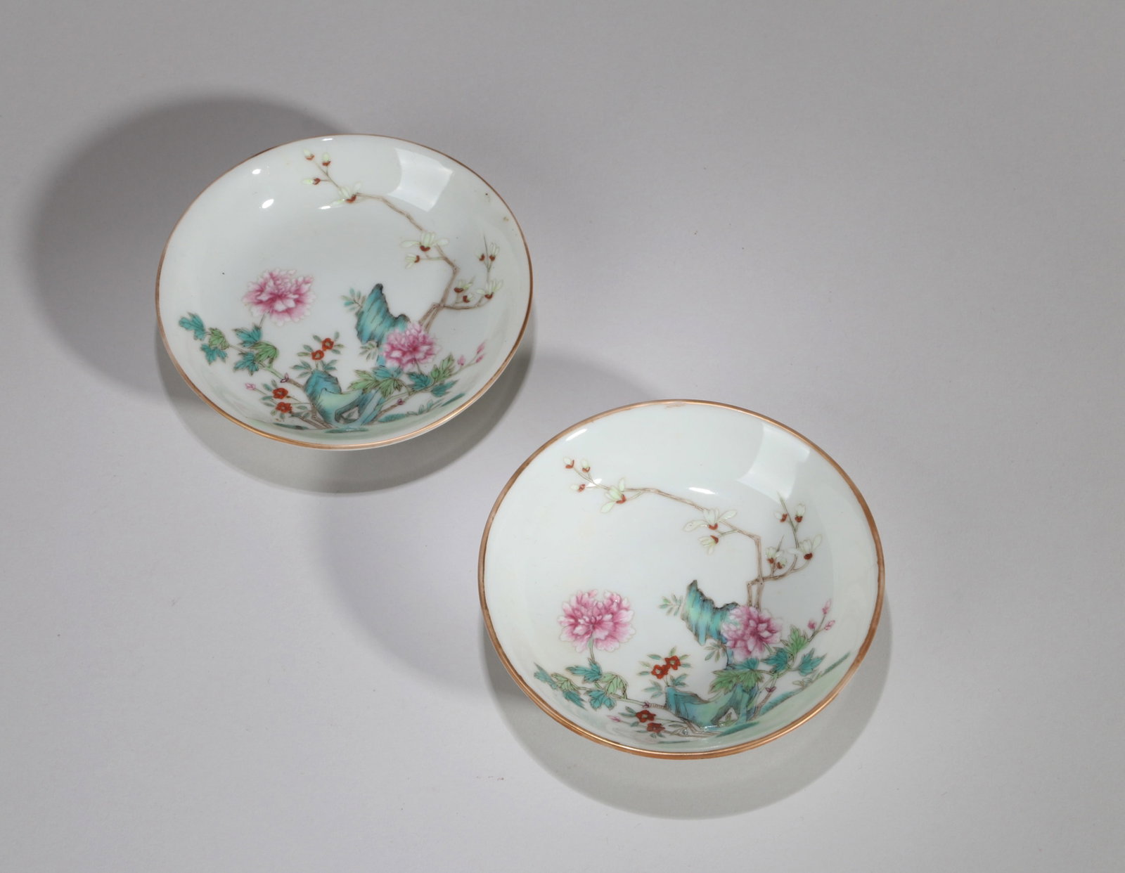 A PAIR OF FAMILLE-ROSE 'ROCKS AND FLOWERS' SMALL DISHES (1 of 6)