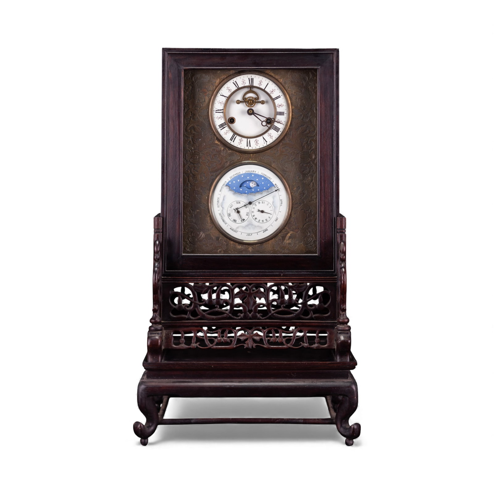 A WOOD-MOUNTED TABLE CLOCK: A wood-mounted table clock with twin-barrel movement striking on a gong, stamped on the back plate and supported on a wooden frame. H70 x 29 x 38 cm