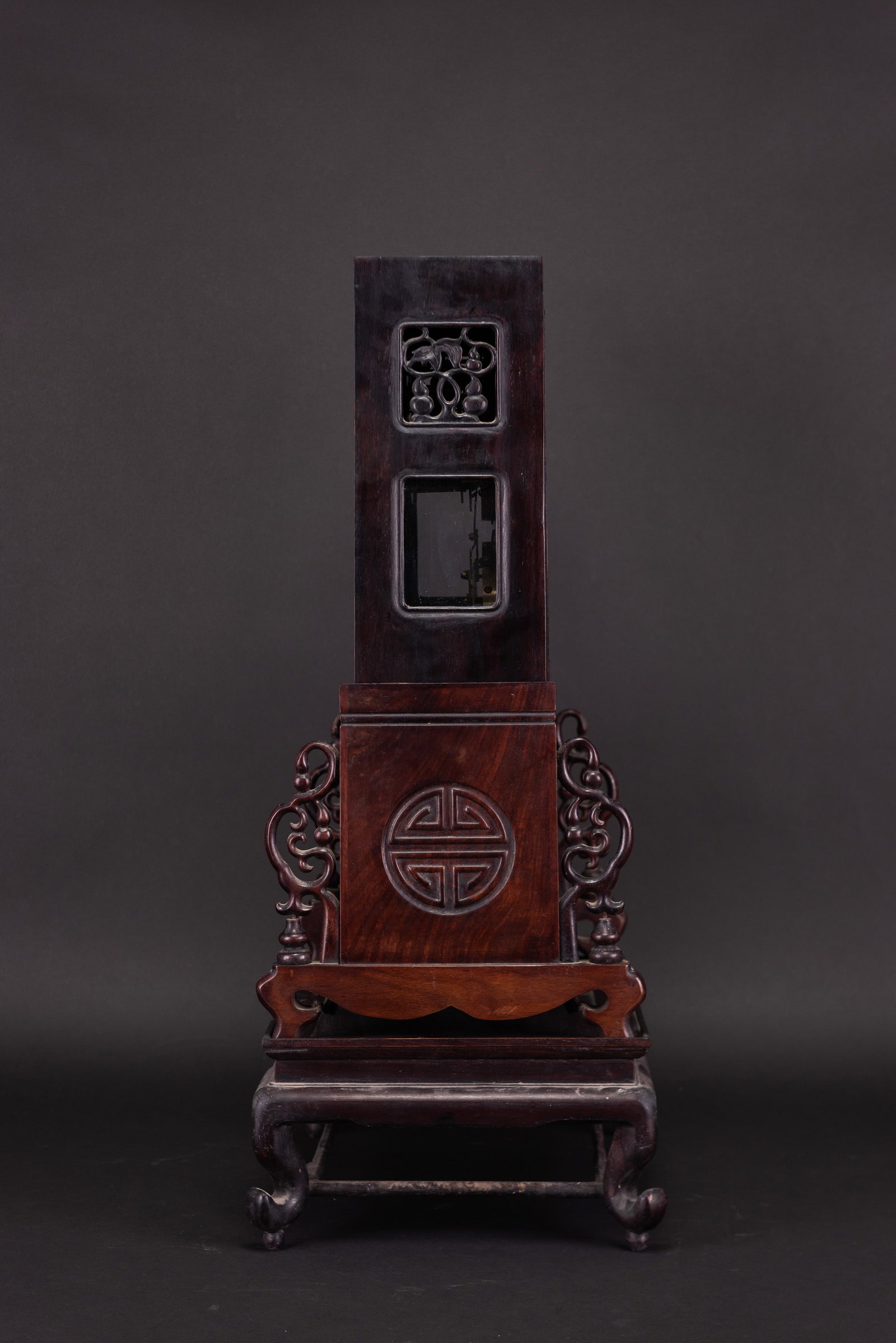 A WOOD-MOUNTED TABLE CLOCK - 8