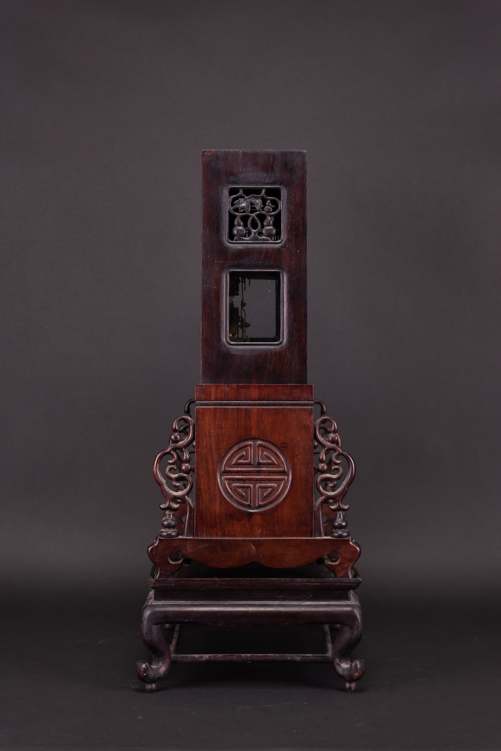 A WOOD-MOUNTED TABLE CLOCK - 9