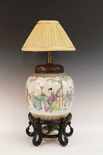 Chinese Famille Rose Porcelain Table Lamp: Chinese Famille Rose Table Lamp, depicting of children dancing and performing in the courtyard. Height 20.5" (with stand)