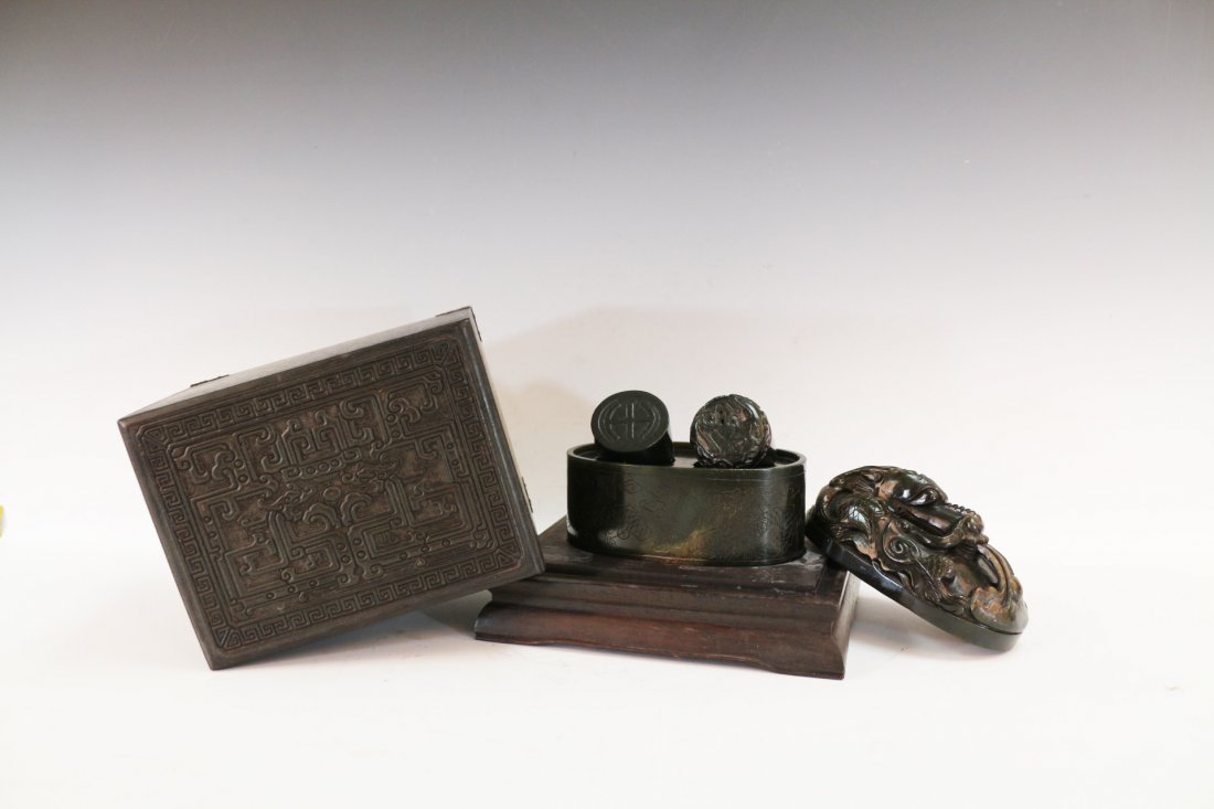 Chinese Soapstone Seal: Chinese Soapstone Seal with wooden box. It comes with two round seal, each is carved with the Chinese character at the bottom. The two round seals are housed inside an oval shaped holder, depicting dr