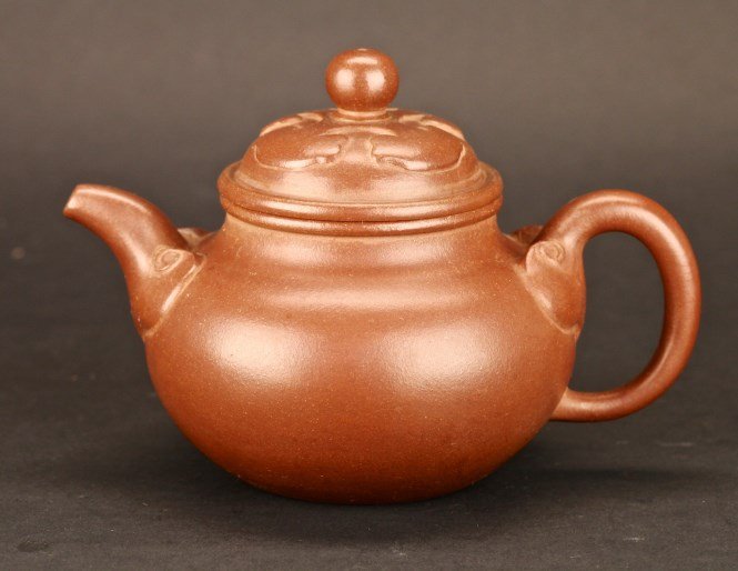 Chinese Clay Teapot: An Antique Gourd-shaped Chinese Teapot in classic Yixing clay. Height 5.5" Length 7.25" Width 4.75"