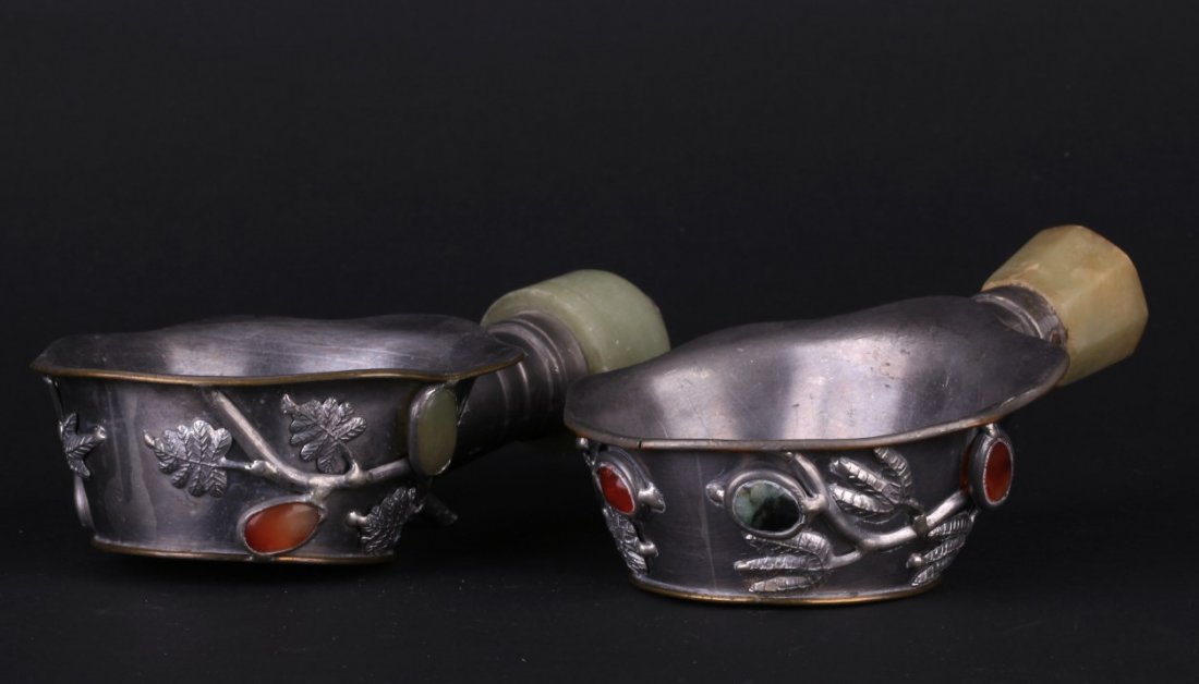 Antique Chinese metal work cup with flowing leaf and: Antique Chinese metal work cup with octagonal jade handle, with flowing leaf and branch design, inlaid with natural gemstones. Length 5.75" Width 4" Height 2" & Length 6.25" Width 3.75" Height1.75"