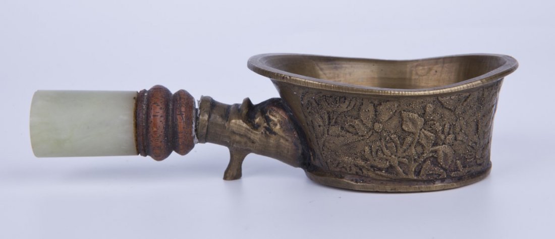 Antique Chinese metal work cup with rose garden: Antique Chinese metal work cup with cylindrical jade handle; with rose garden landscape scenery decorated on both sides of the cup. Length 4.75" Width 2.25" Height 1.25"