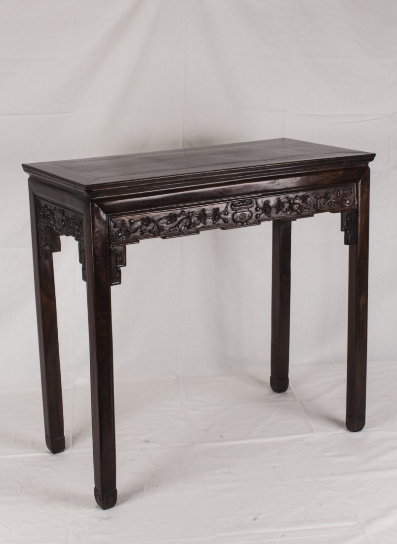 Chinese Rosewood Table, 19th Century: Chinese Rosewood Table, with floral pattern along the sides of the table. 19th Century. Length 36" Width 17.25" Height 34"