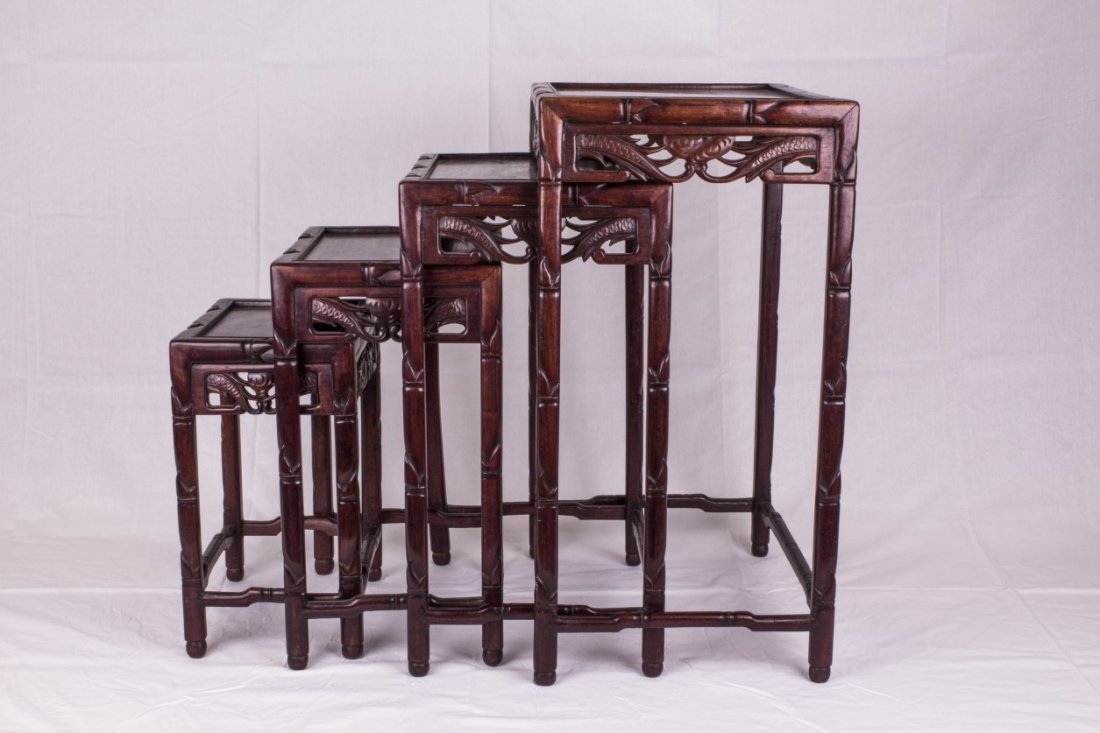 A Set of Four Chinese Rosewood Chest Tables: A Set of Four Chinese Rosewood Chest Table, with dragon carving surrounding the four table sides. Length 14" Width 19.75" Height 27.5"