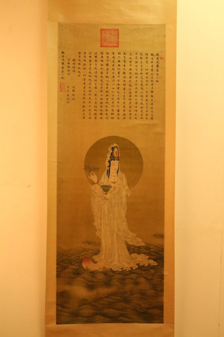 Chinese Scroll Painting: Chinese Scroll Painting, ink and color on paper, depicting the Goddess of Mercy and a Buddhist prayer scripture, unknown artist. Width 18" Height 50"