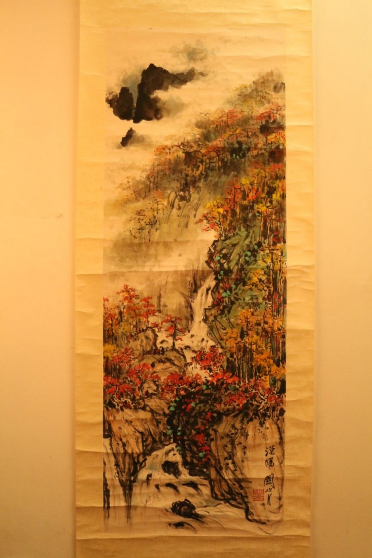 Chinese Scroll Painting: Chinese Scroll Painting, ink and color on paper, depicting mountain landscape scenery with lots of vibrant color flowers, signature after Guan Shanyue. Width 15.5" Height 38"