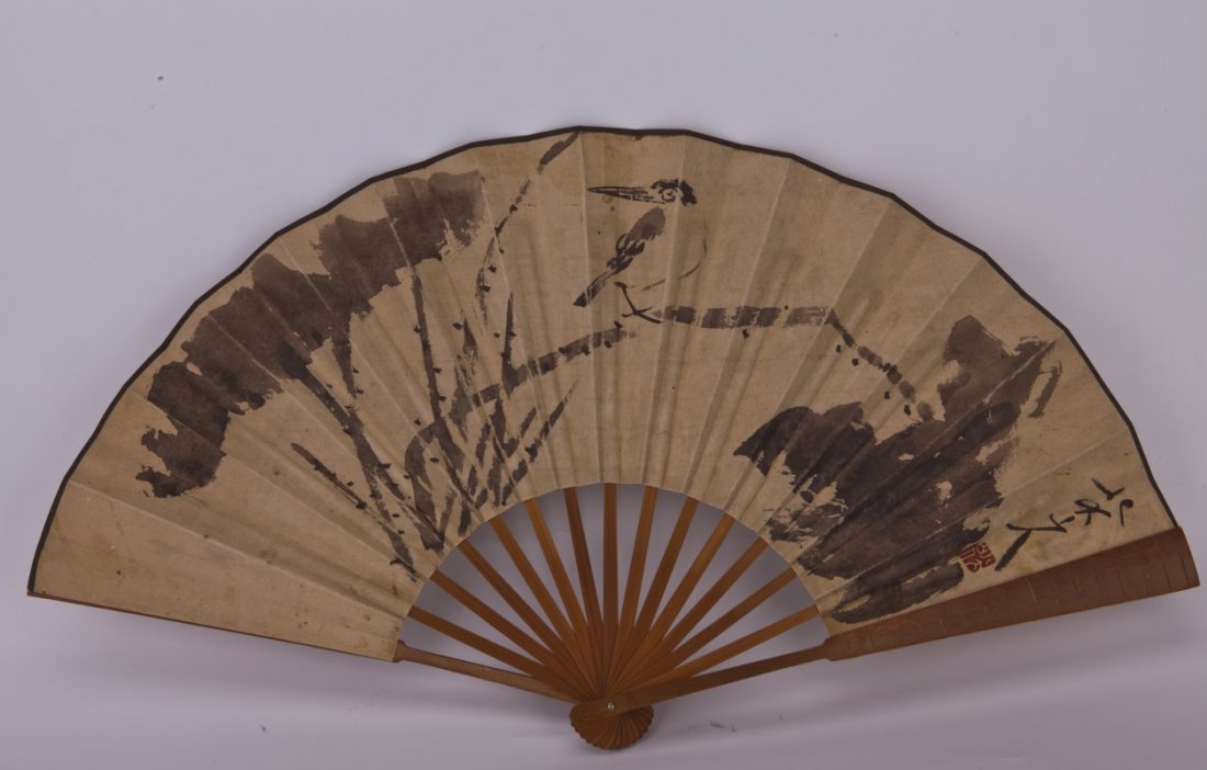 Chinese Fan Painting: Chinese Fan Painting, depicting bamboo trees on one aide and Chinese characters on the other side, signature after Ba Da Shan Ren . Length 13" Width 24"