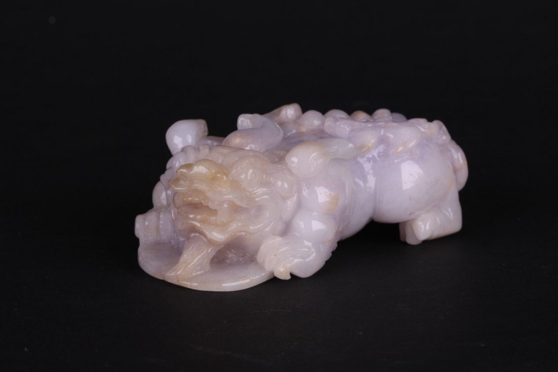 Chinese Carved Jade Toggle: Beautifully carved crouching Pi Yao. Jade Toggle.
