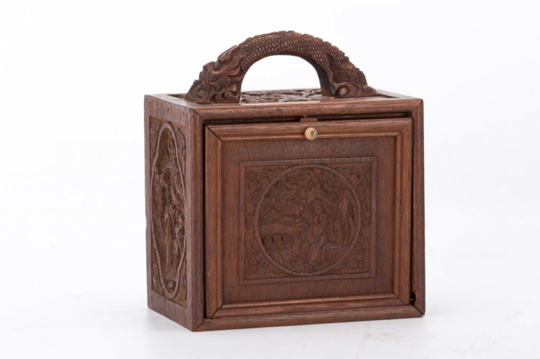 Well carved Chinese hardwood mahjong box with mahjong: Well carved Chinese hardwood mahjong box, of rectangular form, the front panel of the box is designed with two interacting figures on landscape background, with a knob opening that reveals four small 