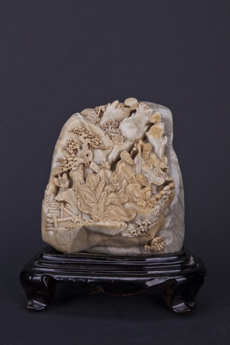 Chinese Soapstone with wooden stand: Chinese Soapstone with wooden stand. Length 6" Width 3.25" Height 7"