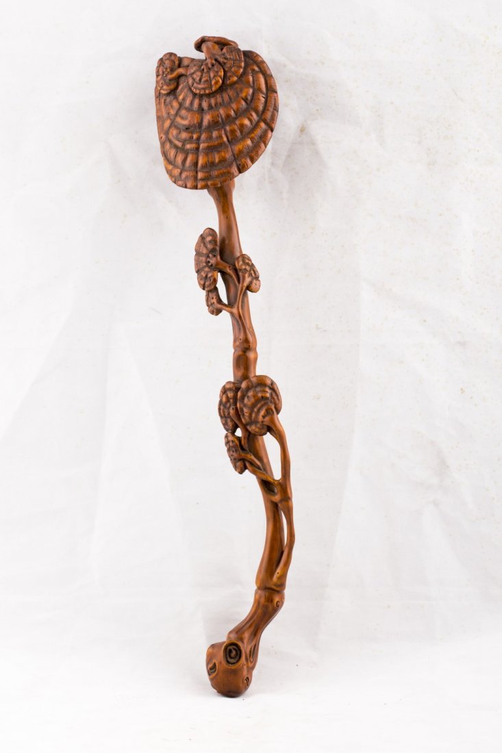Chinese Carved Bamboo Ruyi Scepter: Chinese open work carved ruiyi scepter, with an acorn like shaped tip and slightly curved body. Length 3.5" Width 2.25" Height 16.75"
