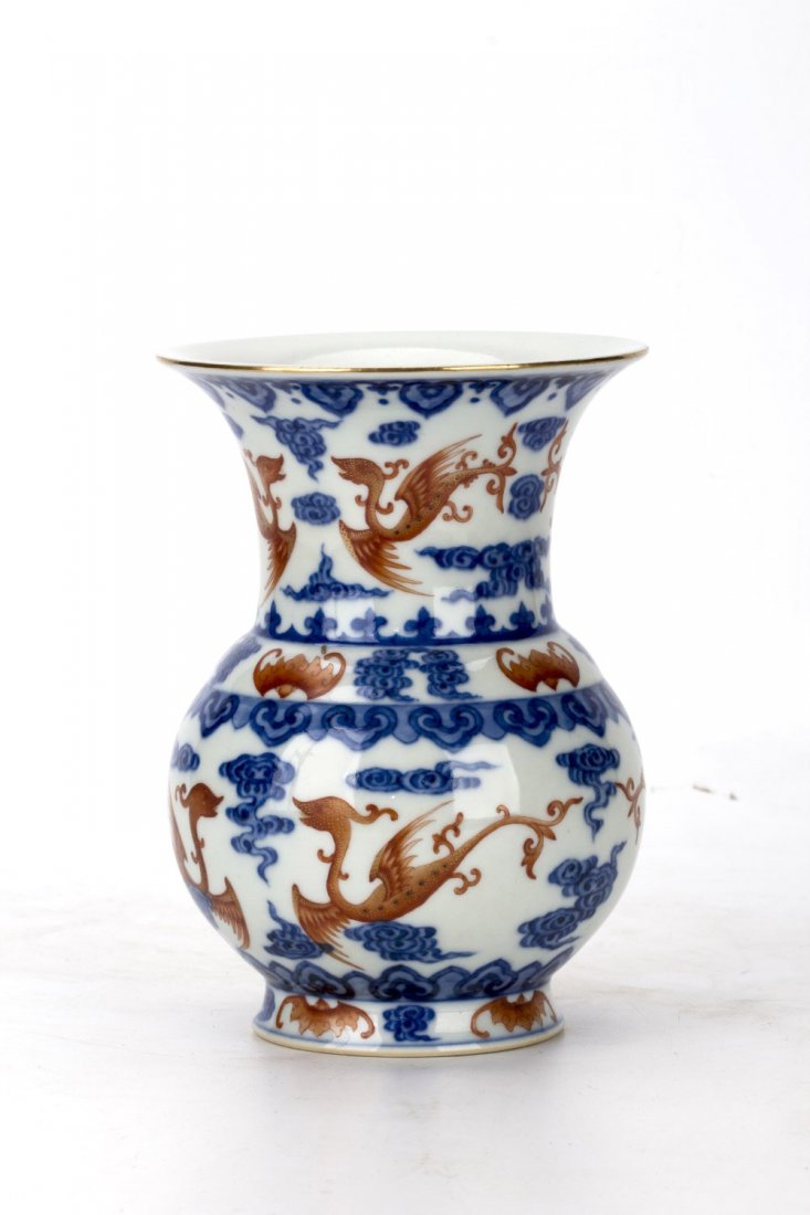 Chinese Blue and White with Iron-red Glazed Porcelain: Chinese Blue and White with Iron-red Glazed Porcelain Vase with wide beaker opening of globular shaped, hand-painted with exquisite pattern of cloud and dragon. Diameter 4.5" Height 6.5"