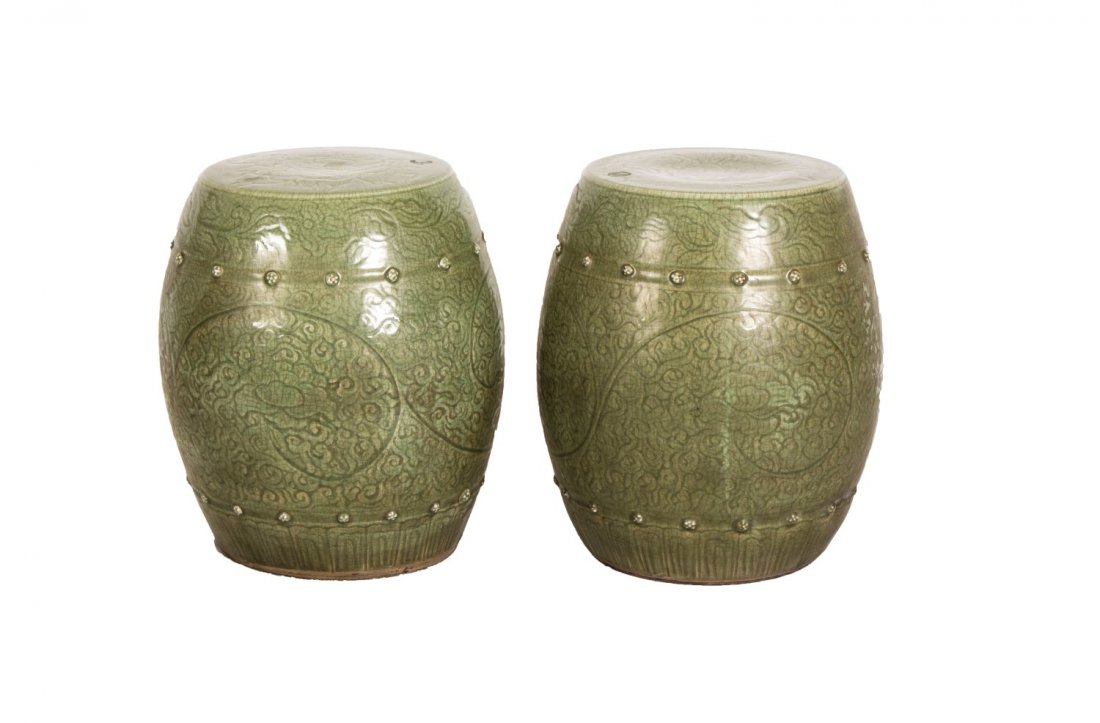 Pair of Chinese Celadon Porcelain Stools: Pair of Chinese Celadon porcelain stools. Length 15.5" Width 17"