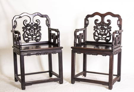 Pair of Chinese Southern Official Armchairs: Pair of beautifully open work carved Chinese Hardwood Southern Official Armchairs. Length 24.25" Width 17.75" Height 38.75"